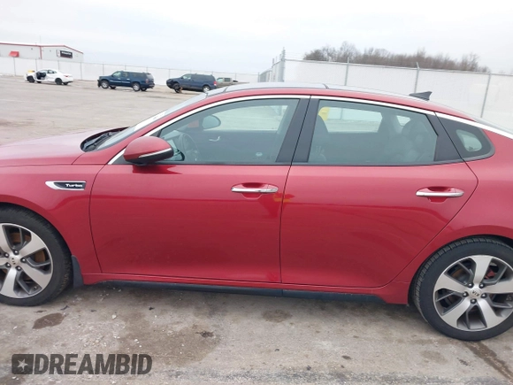 2017 Kia Optima SX z VIN 5XXGW4L24HG141844, wystawiony jako IAAI lot #41425880 z przebiegiem 137 056 mil mil oraz . Historia ofert i sprzedaży dostępna na DreamBid. Obrazek 14.