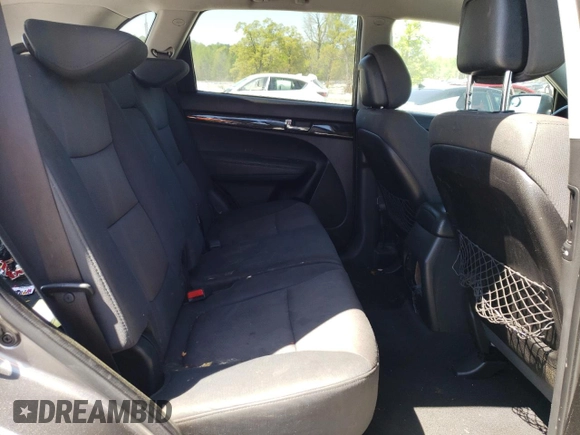 2013 Kia Sorento LX z VIN 5XYKT3A6XDG408459, wystawiony jako Copart lot #52556785 z przebiegiem 195 680 mil mil oraz Szkoda całkowita • Salvage title. Historia ofert i sprzedaży dostępna na DreamBid. Obrazek 11.