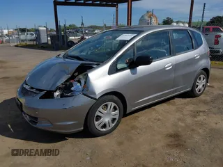 2010 Honda Fit with VIN JHMGE8H25AS020639, listed as a IAAI auction lot 41963459 with 172,560 mi miles. Bid and sale history available at carsss.com. Image 17.