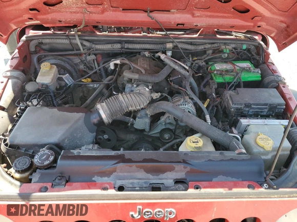 2008 Jeep Wrangler X with VIN 1J4FZ24188L607332, listed as a Copart auction lot 54507785 with 184,153 mi miles and Salvage title. Bid and sale history available at DreamBid. Image 11.