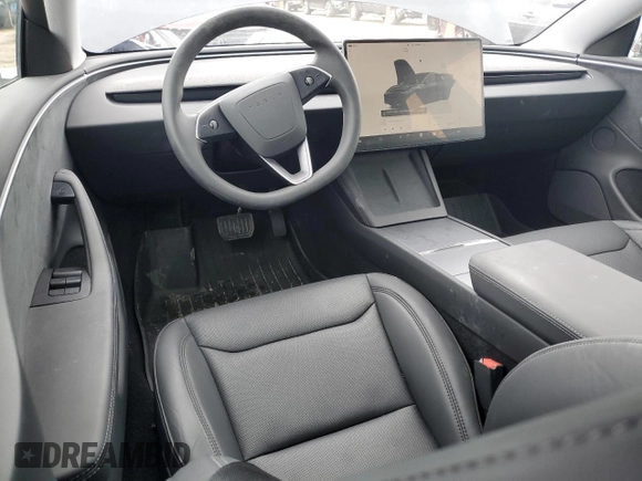 2024 Tesla Model 3 Long Range with VIN 5YJ3E1EB2RF825213, listed as a Copart auction lot 51909875 with 9,717 mi miles and Salvage Title. Bid and sale history available at DreamBid. Image 8.