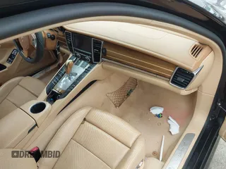 2012 Porsche Panamera with VIN WP0AA2A73CL011361, listed as a IAAI auction lot 41564053 with 126,446 mi miles and . Bid and sale history available at DreamBid. Image 5.
