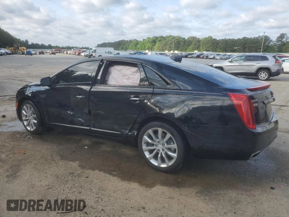 2016 Cadillac XTS Luxury Collection with VIN 2G61M5S36G9111734, listed as a Copart auction lot 52993995 with 102,799 mi miles and Salvage title. Bid and sale history available at DreamBid. Image 2.