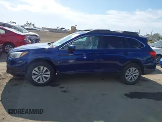 2015 Subaru Outback Premium with VIN 4S4BSBDC2F3290862, listed as a IAAI auction lot 42011007 with 152,628 mi miles and . Bid and sale history available at DreamBid. Image 14.