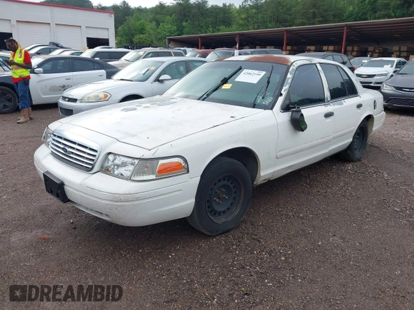2001 Ford Crown Victoria Police Interceptor z VIN 2FAFP71W21X165218, wystawiony jako IAAI lot #42062199 z przebiegiem 233 978 mil mil oraz . Historia ofert i sprzedaży dostępna na DreamBid. Obrazek 2.