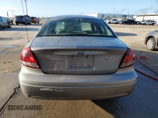 2007 Ford Taurus SE z VIN 1FAFP53U57A105399, wystawiony jako Copart lot #44436805 z przebiegiem Nie podano mil oraz Szkoda całkowita • Salvage title. Historia ofert i sprzedaży dostępna na DreamBid. Obrazek 6.