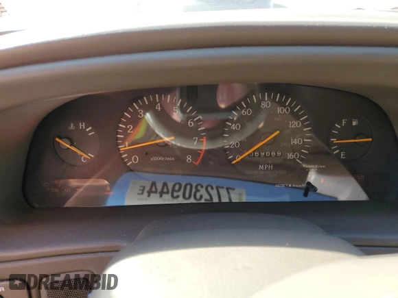 1994 Infiniti Q45 z VIN JNKNG01D3RM252218, wystawiony jako Copart lot #77230944 z przebiegiem 69 069 mil mil oraz Czysty tytuł • Clean title. Historia ofert i sprzedaży dostępna na DreamBid. Obrazek 9.