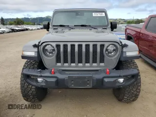 2019 Jeep Wrangler Unlimited Rubicon with VIN 1C4HJXFG6KW661609, listed as a Copart auction lot 55527005 with 25,302 mi miles and Salvage title. Bid and sale history available at DreamBid. Image 5.