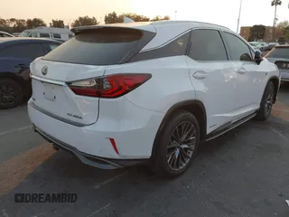 2019 Lexus RX with VIN 2T2BGMCAXKC036573, listed as a IAAI auction lot 41299079 with 104,568 mi miles. Bid and sale history available at carsss.com. Image 4.