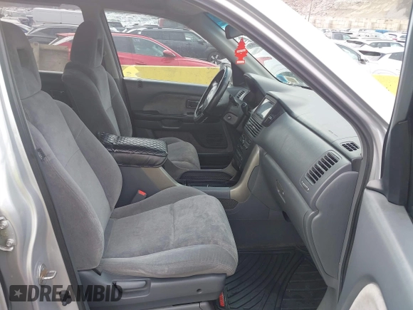 2005 Honda Pilot EX with VIN 2HKYF184X5H533837, listed as a IAAI auction lot 41900265 with 163,522 mi miles. Bid and sale history available at carsss.com. Image 5.