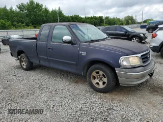 1999 Ford F-150 with VIN 2FTZX1729XCA64069, listed as a Copart auction lot 56246845 with Not provided miles and Salvage title. Bid and sale history available at DreamBid. Image 4.