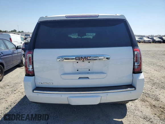 2020 GMC Yukon Denali with VIN 1GKS2CKJ0LR109590, listed as a Copart auction lot 68700384 with 55,310 mi miles and Salvage Title. Bid and sale history available at carsss.com. Image 6.