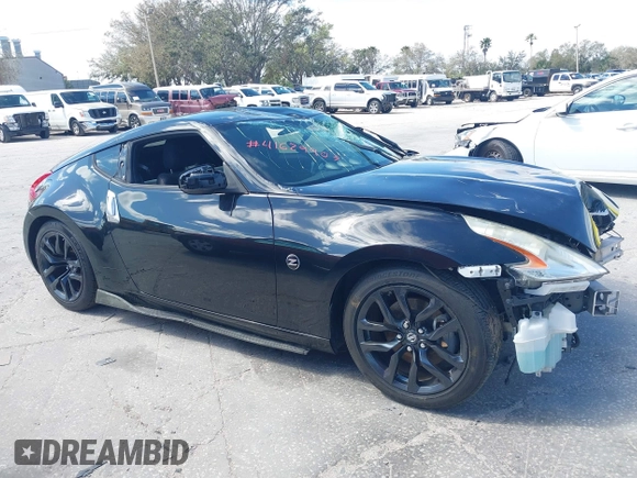 2017 Nissan 370Z with VIN JN1AZ4EH5HM954458, listed as a IAAI auction lot 41629907 with 113,606 mi miles. Bid and sale history available at carsss.com. Image 12.