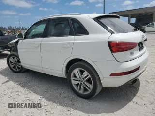 2018 Audi Q3 Premium with VIN WA1ECCFS1JR034690, listed as a Copart auction lot 55047735 with 73,488 mi miles and Salvage title. Bid and sale history available at DreamBid. Image 2.