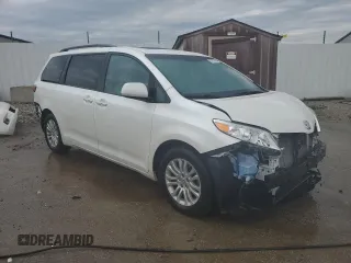 2015 Toyota Sienna XLE with VIN 5TDYK3DC6FS630405, listed as a Copart auction lot 59872045 with 60,306 mi miles and Salvage title. Bid and sale history available at DreamBid. Image 4.