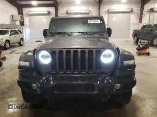 2023 Jeep Wrangler Sport Altitude with VIN 1C4HJXDG0PW679789, listed as a Copart auction lot 65991094 with 13,503 mi miles and Salvage Title. Bid and sale history available at DreamBid. Image 5.