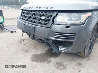 2015 Land Rover Range Rover HSE z VIN SALGS2VF8FA231130, wystawiony jako IAAI lot #41881459 z przebiegiem Nie podano mil oraz . Historia ofert i sprzedaży dostępna na DreamBid. Obrazek 17.