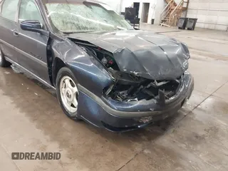 2002 Chevrolet Impala LS z VIN 2G1WH55K529142095, wystawiony jako IAAI lot #42145543 z przebiegiem 214 718 mil mil oraz . Historia ofert i sprzedaży dostępna na DreamBid. Obrazek 6.