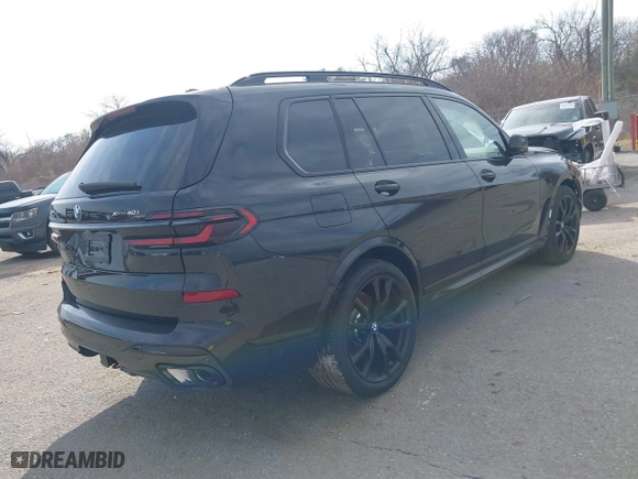 2025 BMW X7 xDrive40i with VIN 5UX23EM04S9X31373, listed as a IAAI auction lot 41429790 with 1,880 mi miles. Bid and sale history available at carsss.com. Image 4.