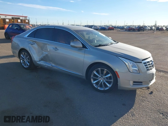 2014 Cadillac XTS Luxury z VIN 2G61N5S3XE9298471, wystawiony jako IAAI lot #41069292 z przebiegiem 92 112 mil mil oraz . Historia ofert i sprzedaży dostępna na DreamBid. Obrazek 1.