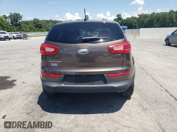 2012 Kia Sportage LX with VIN KNDPB3A20C7276250, listed as a Copart auction lot 61804995 with 112,303 mi miles and Salvage title. Bid and sale history available at DreamBid. Image 6.