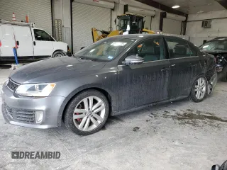 2014 Volkswagen Jetta GLI z VIN 3VW4T7AJ6EM398115, wystawiony jako Copart lot #89179925 z przebiegiem 81 264 mil mil oraz Szkoda całkowita • Salvage title. Historia ofert i sprzedaży dostępna na DreamBid. Obrazek 1.