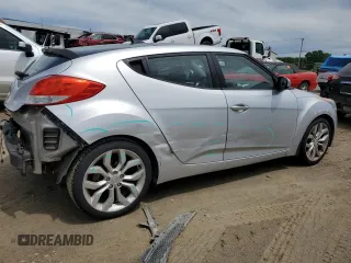 2013 Hyundai Veloster w/Gray Int z VIN KMHTC6AD3DU135296, wystawiony jako Copart lot #59778985 z przebiegiem 125 134 mil mil oraz Czysty tytuł • Clean title. Historia ofert i sprzedaży dostępna na DreamBid. Obrazek 3.