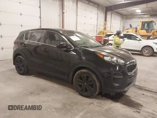2018 Kia Sportage LX with VIN KNDPM3AC6J7417371, listed as a IAAI auction lot 41879390 with 112,944 mi miles and . Bid and sale history available at carsss.com. Image 1.