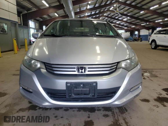 2010 Honda Insight LX z VIN JHMZE2H5XAS018546, wystawiony jako Copart lot #61411545 z przebiegiem 55 814 mil mil oraz Czysty tytuł • Clean title. Historia ofert i sprzedaży dostępna na DreamBid. Obrazek 5.
