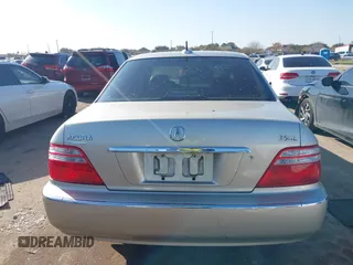 2004 Acura RL w/Navigation System with VIN JH4KA96674C007830, listed as a IAAI auction lot 41146234 with 80,611 mi miles. Bid and sale history available at carsss.com. Image 16.