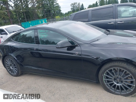 2021 Tesla Model S Plaid with VIN 5YJSA1E62MF447509, listed as a IAAI auction lot 42509281 with 32,372 mi miles and . Bid and sale history available at DreamBid. Image 14.