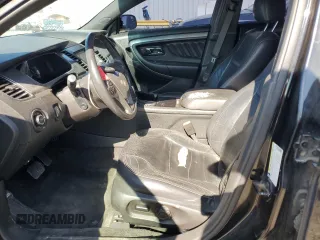 2015 Ford Taurus SEL with VIN 1FAHP2E89FG180089, listed as a Copart auction lot 58445555 with 151,240 mi miles and Salvage title. Bid and sale history available at DreamBid. Image 7.