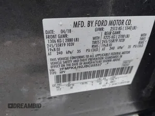 2018 Ford Edge SEL with VIN 2FMPK4J92JBC05537, listed as a IAAI auction lot 41677902 with 71,476 mi miles. Bid and sale history available at carsss.com. Image 9.
