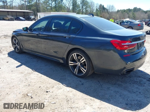 2016 BMW 7 Series 740i with VIN WBA7E2C54GG714649, listed as a IAAI auction lot 41815220 with 89,029 mi miles. Bid and sale history available at carsss.com. Image 3.