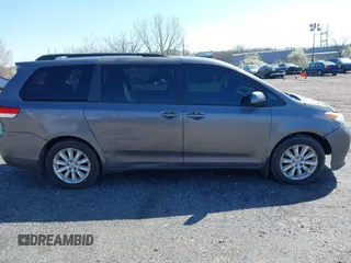2011 Toyota Sienna LE with VIN 5TDJK3DC1BS016258, listed as a IAAI auction lot 41995140 with 200,903 mi miles. Bid and sale history available at carsss.com. Image 13.