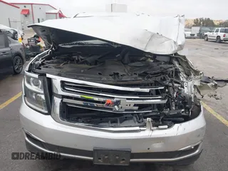 2015 Chevrolet Suburban LTZ with VIN 1GNSCKKC1FR507665, listed as a IAAI auction lot 41517753 with 162,604 mi miles. Bid and sale history available at carsss.com. Image 6.
