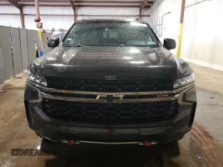 2022 Chevrolet Suburban Z71 with VIN 1GNSKDKDXNR198199, listed as a Copart auction lot 65367055 with 115,505 mi miles and Clean title. Bid and sale history available at DreamBid. Image 5.