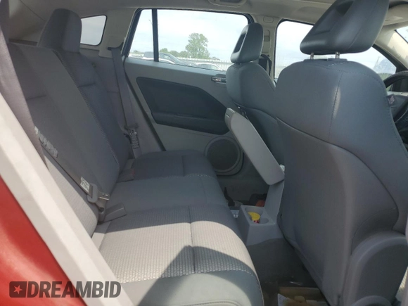 2007 Dodge Caliber SXT z VIN 1B3HB48B97D202527, wystawiony jako Copart lot #57245085 z przebiegiem 133 366 mil mil oraz Szkoda całkowita • Salvage title. Historia ofert i sprzedaży dostępna na DreamBid. Obrazek 11.