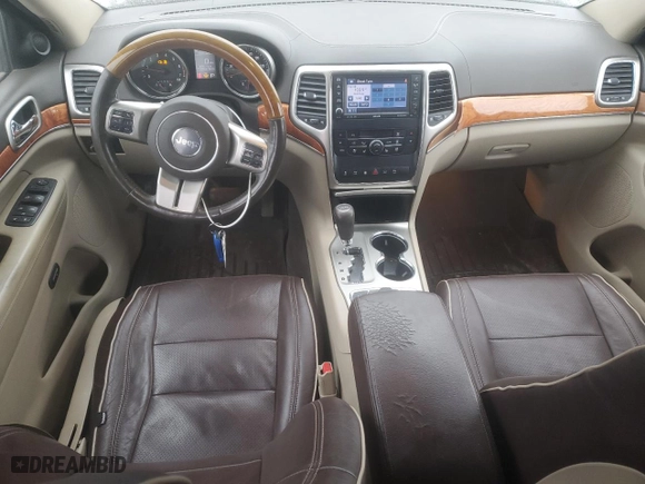 2011 Jeep Grand Cherokee Overland Summit with VIN 1J4RR6GT6BC606446, listed as a Copart auction lot 48924125 with 112,939 mi miles and Salvage Title. Bid and sale history available at carsss.com. Image 8.