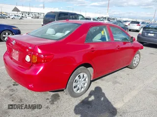 2009 Toyota Corolla with VIN 1NXBU40E89Z128777, listed as a IAAI auction lot 41706079 with 123,184 mi miles. Bid and sale history available at carsss.com. Image 4.
