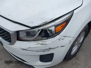 2015 Kia Sedona L with VIN KNDMA5C12F6031286, listed as a IAAI auction lot 42002214 with 185,814 mi miles. Bid and sale history available at carsss.com. Image 13.