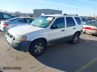 2003 Ford Escape XLT Popular with VIN 1FMYU03193KC46125, listed as a IAAI auction lot 41752254 with 186,929 mi miles. Bid and sale history available at carsss.com. Image 2.
