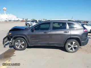 2020 Jeep Cherokee Limited with VIN 1C4PJMDX0LD606891, listed as a IAAI auction lot 41743197 with 155,256 mi miles. Bid and sale history available at carsss.com. Image 14.