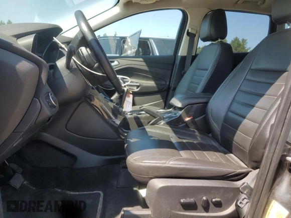 2016 Ford Escape Titanium with VIN 1FMCU9J98GUB32375, listed as a Copart auction lot 59564885 with 123,548 mi miles and Salvage title. Bid and sale history available at DreamBid. Image 7.