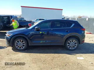 2019 Mazda CX-5 Grand Touring with VIN JM3KFBDM2K1685168, listed as a IAAI auction lot 41323598 with 88,429 mi miles. Bid and sale history available at carsss.com. Image 14.