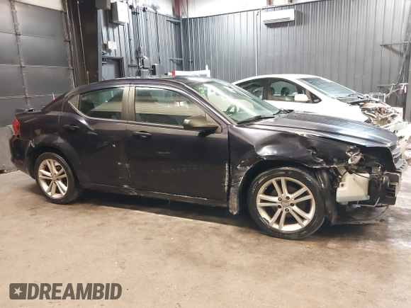 2012 Dodge Avenger SE with VIN 1C3CDZAGXCN287490, listed as a IAAI auction lot 42142222 with 122,310 mi miles and . Bid and sale history available at DreamBid. Image 14.