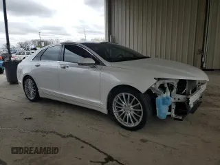 2016 Lincoln MKZ with VIN 3LN6L2J9XGR615607, listed as a Copart auction lot 53950915 with 100,368 mi miles and Salvage Title. Bid and sale history available at DreamBid. Image 4.