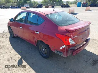 2015 Nissan Versa SV with VIN 3N1CN7APXFL906108, listed as a IAAI auction lot 41674926 with 135,613 mi miles. Bid and sale history available at carsss.com. Image 3.