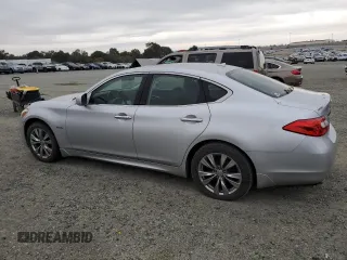 2012 Infiniti M Hybrid with VIN JN1EY1AP9CM910360, listed as a Copart auction lot 80273314 with 121,217 mi miles and Clean title. Bid and sale history available at DreamBid. Image 2.