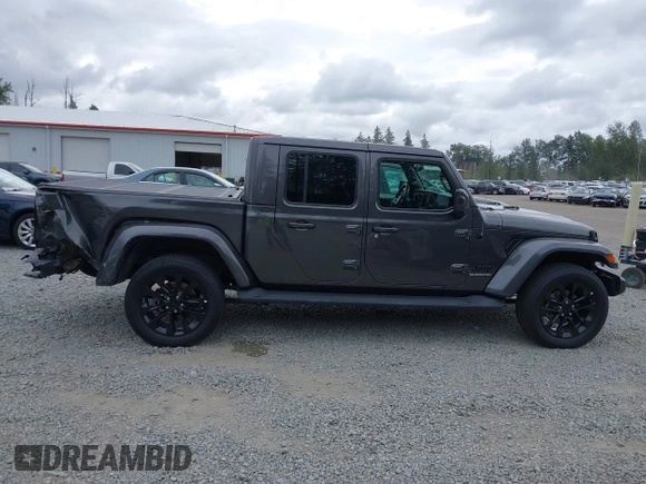 2021 Jeep Gladiator High Altitude with VIN 1C6HJTFG8ML567087, listed as a IAAI auction lot 42549990 with 30,437 mi miles and . Bid and sale history available at DreamBid. Image 14.